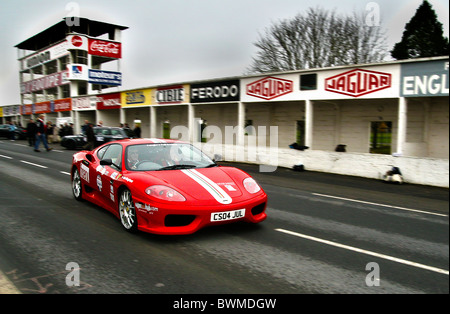 Ferrari Challenge Stradale driving at speed at the old Reims Gueux F1 track in France during the 2010 Beaujolais Run Stock Photo