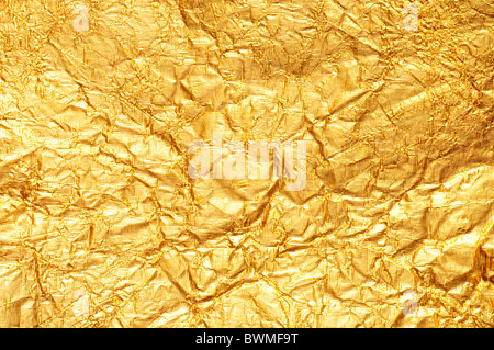 Crumpled gold foil textured background Horizontal Stock Photo