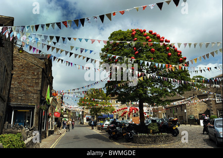 Grassington Village, Yorkshire Dales, North Yorkshire UK decorated with bunting for the summer festival Stock Photo