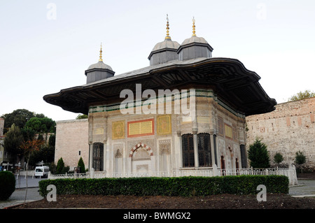 The Fountain of Sultan Ahmed III  is a rococo structure in the square in front of the Imperial Gate of Topkapı Palace, Istanbul Stock Photo