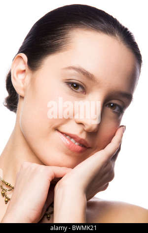 Face of lovely miss touching it by her hands Stock Photo
