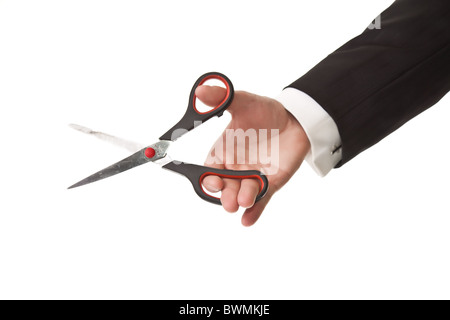 Man holding scissors on white isolated background Stock Photo