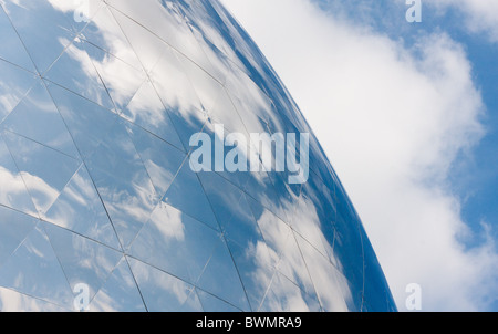 Clouds reflecting in giant silver globe at Cite des sciences, Paris France Stock Photo