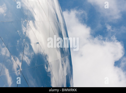 Clouds reflecting in giant silver globe at Cite des sciences, Paris France Stock Photo