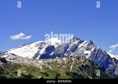 Aerial view of Canazei and Fassa valley with Saas Pordoi mount (Sella group) Pordoi pass and Fedaia pass dolomiti unesco Stock Photo