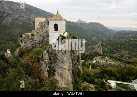 Europe, Spain, Valencia, Province of Alicante, Guadalest. Historic Saint Joseph Castle mountain top bell tower. Stock Photo