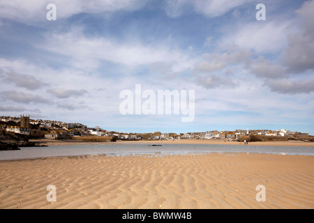 The view at low tide from Porthminster beach to St Ives in Cornwall Stock Photo