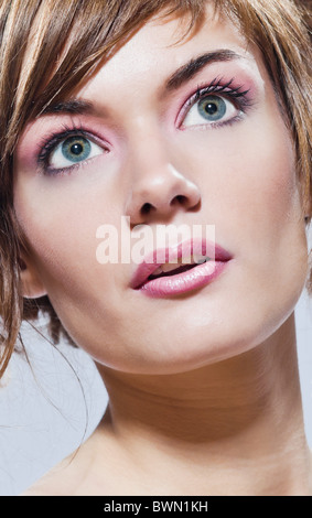 beautiful young caucasian woman close-up portrait face  girl on studio isolated background Stock Photo