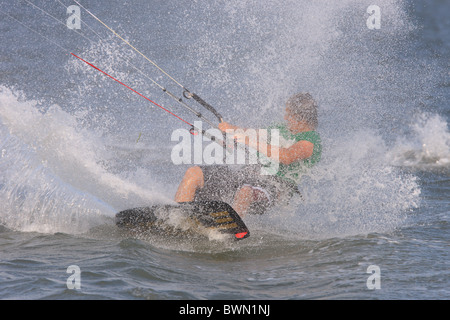 Kite boarder just off of Fort Desoto Park, a popular location for kite boarding in Tampa Bay Stock Photo