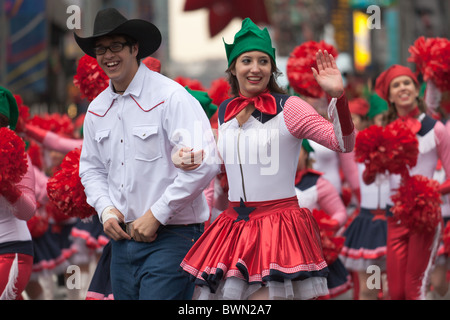 Members of the Spirit of America Dance Team perform in the 2010 Macy's Thanksgiving Day Parade in New York City. Stock Photo