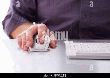 USA, Illinois, Metamora, Man using computer, close-up of hand on mouse Stock Photo