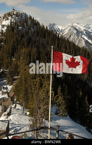 Canadian flag flying atop Sulphur Mountain, Banff, Alberta, Canada. Stock Photo