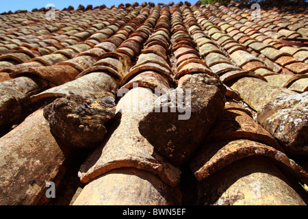 clay roof tiles old aged arabic style in Spain perspective Stock Photo
