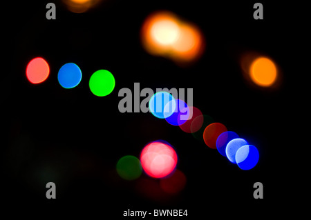 Out of focus lights on the front of a bus in India Stock Photo