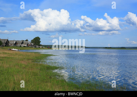 Russia Russian Archangelsk region Arkhangelsk Europe Northern Northwestern wooden blue sky Rural countryside Stock Photo