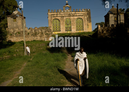 a man in white in front of the old church of st mary of zion, axum, ethiopia Stock Photo