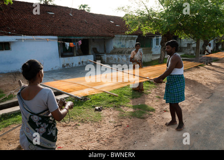 Drying silk yarn ;old tradition practiced by weavers in Kanchipuram; kancheepuram ,Tamil Nadu,India Stock Photo