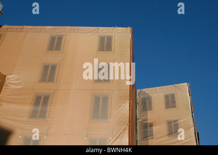 plastic covers on buildings being renovated in rome, italy Stock Photo