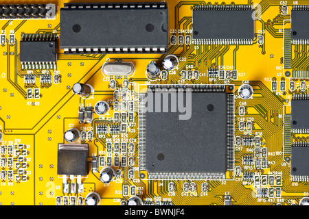 A close up shot of the backside of a computer circuit board, also known as a motherboard. Stock Photo