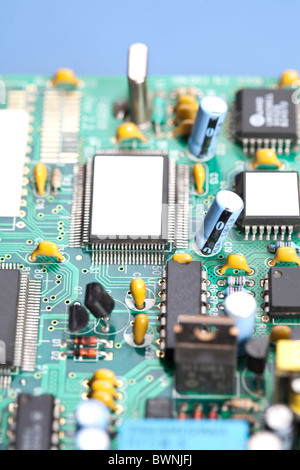 A close up shot of the backside of a computer circuit board, also known as a motherboard. Stock Photo