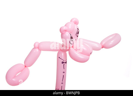 Pink panther sculpture made from twisted balloons isolated on white background. Stock Photo