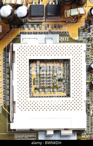 A close up shot of the backside of a computer circuit board Stock Photo