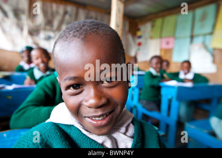 Schoolboy from Mathare slums in Maji Mazuri Centre and School, Nairobi, Kenya Stock Photo