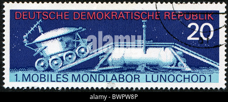 GRD - CIRCA 1971: stamp printed in East Germany shows the soviet moon machine Lunokhod - 1 , circa 1971 Stock Photo