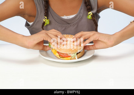 Portrait of a girl with a hamburger Stock Photo