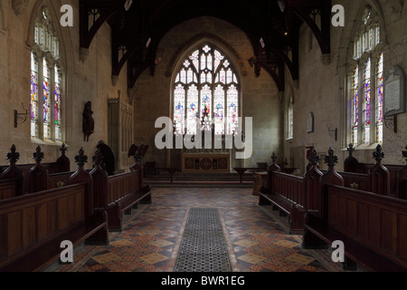 A westerly aspect of the Choir, altar and detailed tile flooring in the historic Saint Mary Magdalene Church at Battlefield. Stock Photo