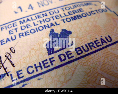 Passport with a rubber stamp from the Tourist Office at  Timbuktu. Mali Stock Photo