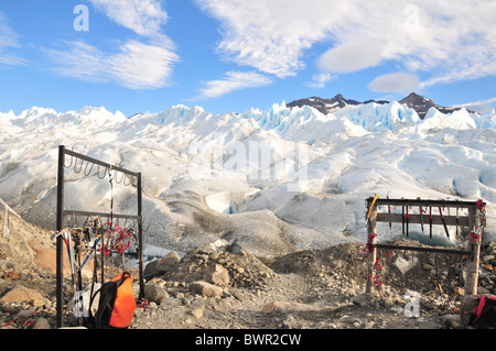 Two crampon stands, on moraine 'boulder clay' at the foot of the Perito Moreno Glacier terminus, Brazo Rico ice station, Andes Stock Photo