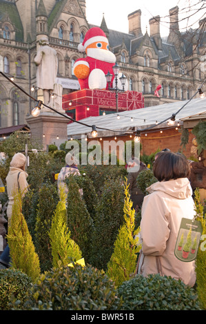 Shoppers at Manchester's Christmas Market, Albert Square.