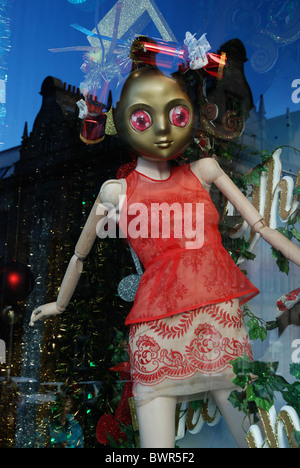 A female figure, part of the Harvey Nichols Christmas window display in Edinburgh, Scotland, UK. Stock Photo