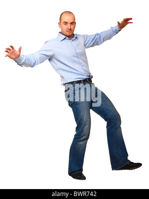 young man try to balance himself isolated on white Stock Photo