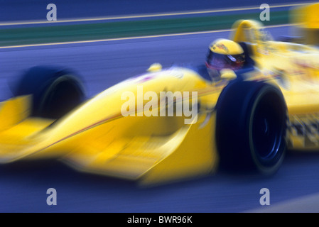 Blurred auto racing action. Stock Photo