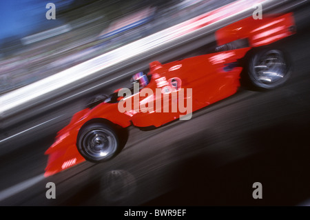 Blurred auto racing action. Stock Photo
