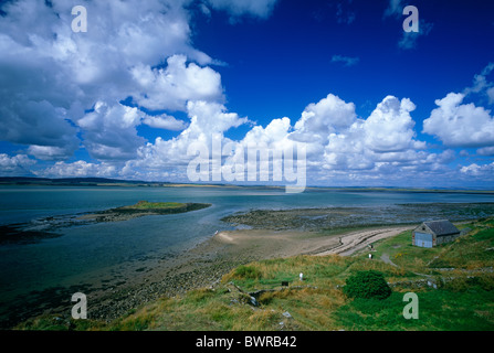 A view of St. Cuthbert's Island from The Holy Island of Lindisfarne at low tide, Northumberland Stock Photo