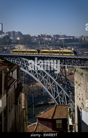 Train over the bridge in Porto, Portugal. Stock Photo