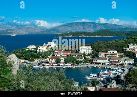 Kassiopi - a fishing village on north-eastern coast of Corfu off the coast  of Albania Stock Photo - Alamy