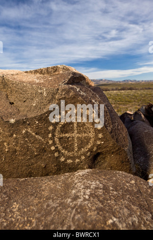 Petroglyph with circle and dot motif made by the Jornada Mogollon tribe at the Three Rivers Petroglyph Site, New Mexico USA. Stock Photo