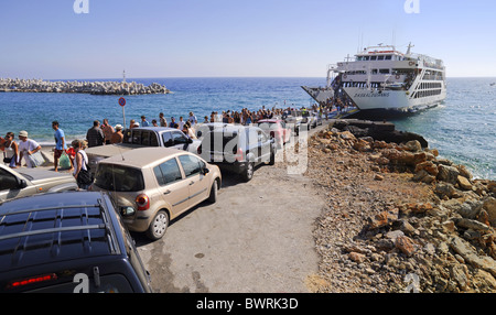Car queue to the ferry in the docks of Chora Sfakion, Crete Stock Photo