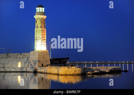 Lighthouse in the night in Rethymno port, Crete Stock Photo