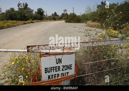 Sign on a fence labeled UN Buffer Zone Keep Out, Nicosia, Cyprus Stock Photo
