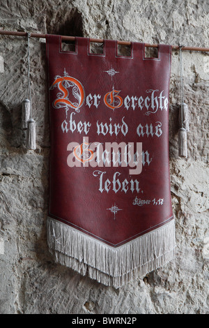 'Der Gerechte aber wird aus Glauben leben', the just shall live by faith, flag, great hall, Burg Hardeg palace Stock Photo