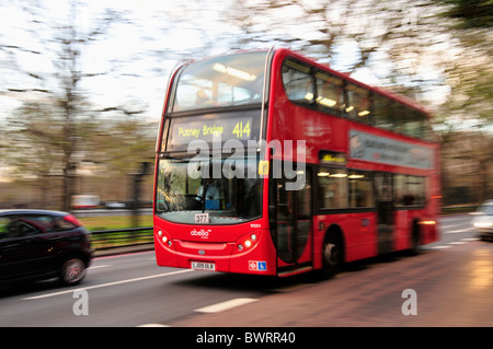 Red double-decker bus at Hyde Park, London, England, United Kingdom, Europe