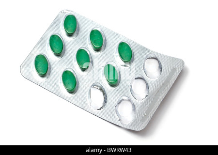 green pills isolated on white background Stock Photo