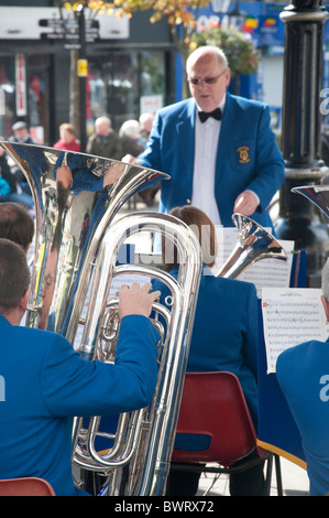 The Stacksteads Brass Band from Rossendale performing in Burnley town Centre in Lancashire England Stock Photo