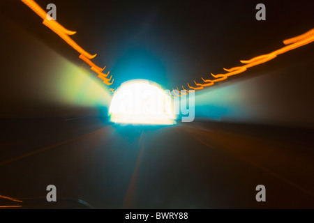 Abstracted picture of blurred lights in tunnel Stock Photo