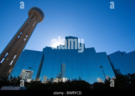 Reunion Tower in Dallas, Texas is silhouetted by the warm sunshine. Stock Photo